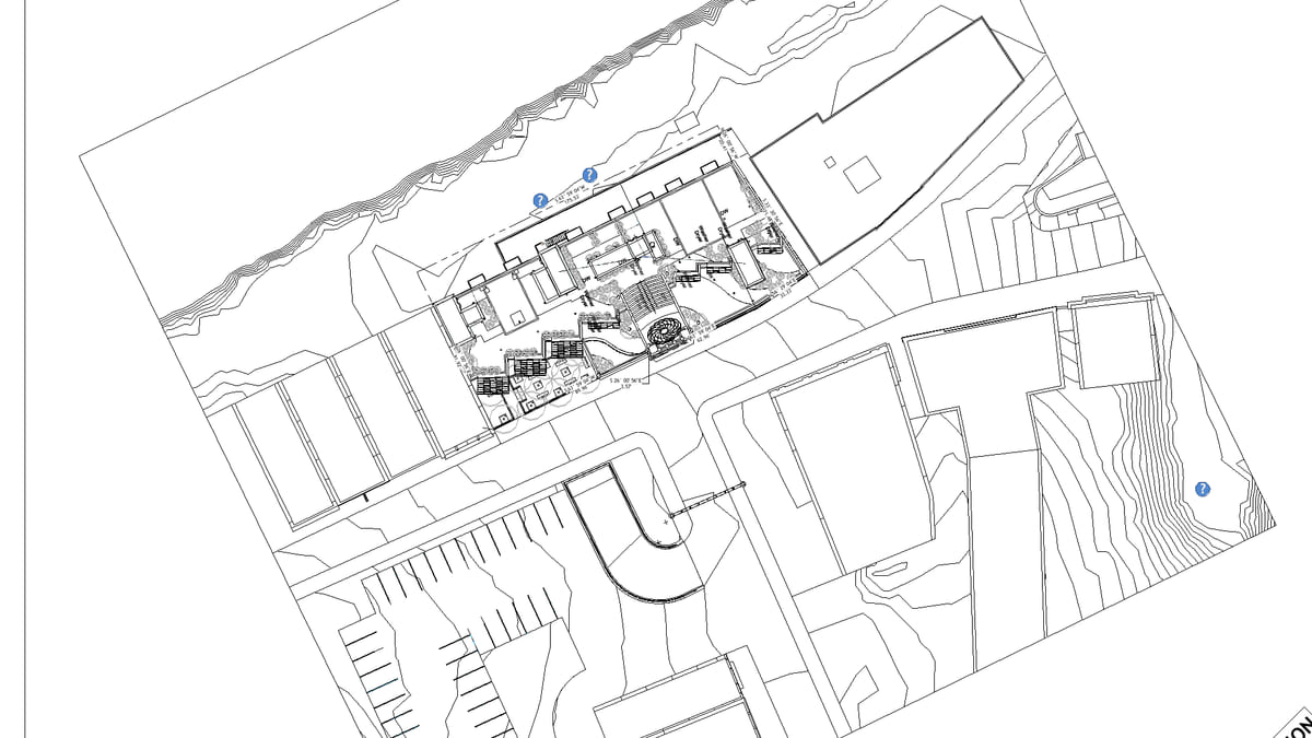 A Revit site plan with property lines and survey setting-out that should not move